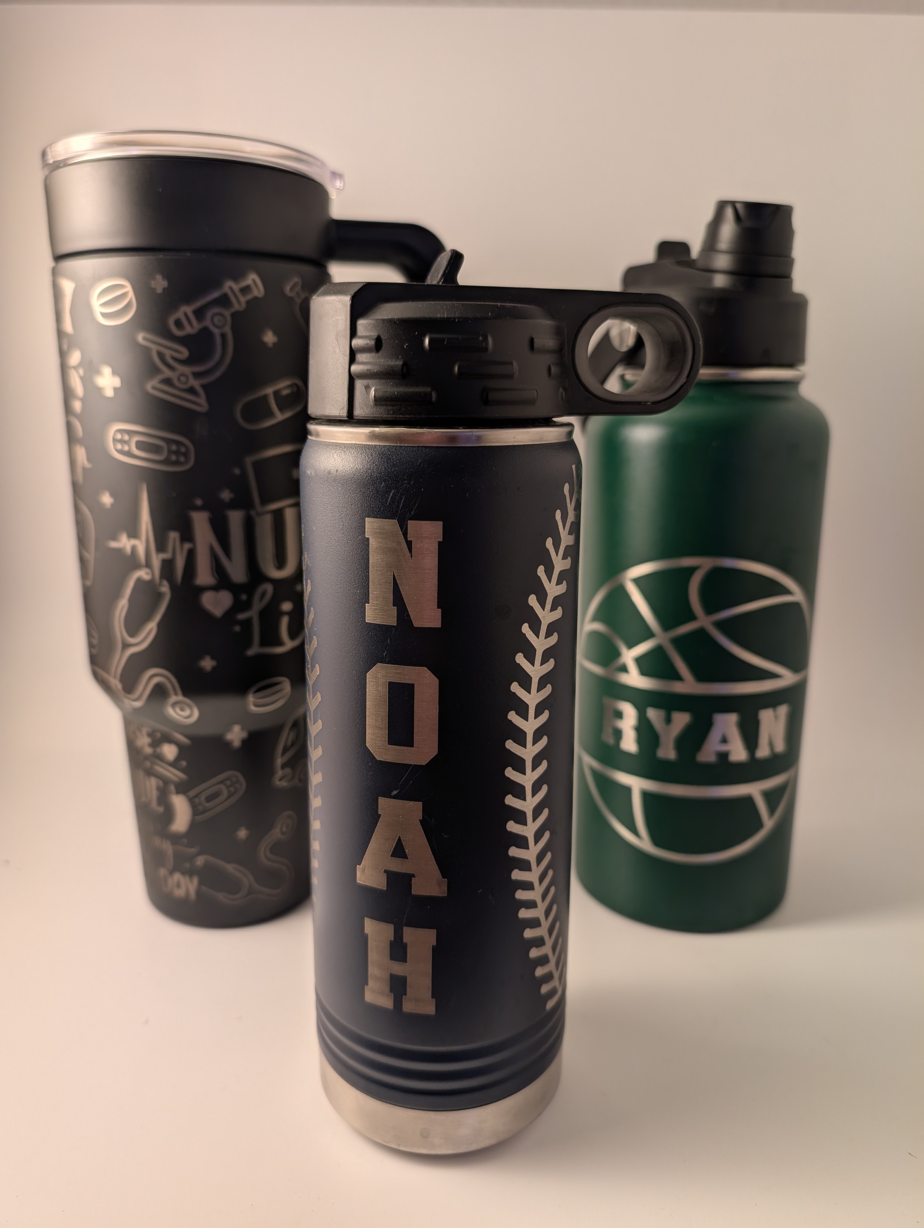 Laser-engraved tumblers and drinkware